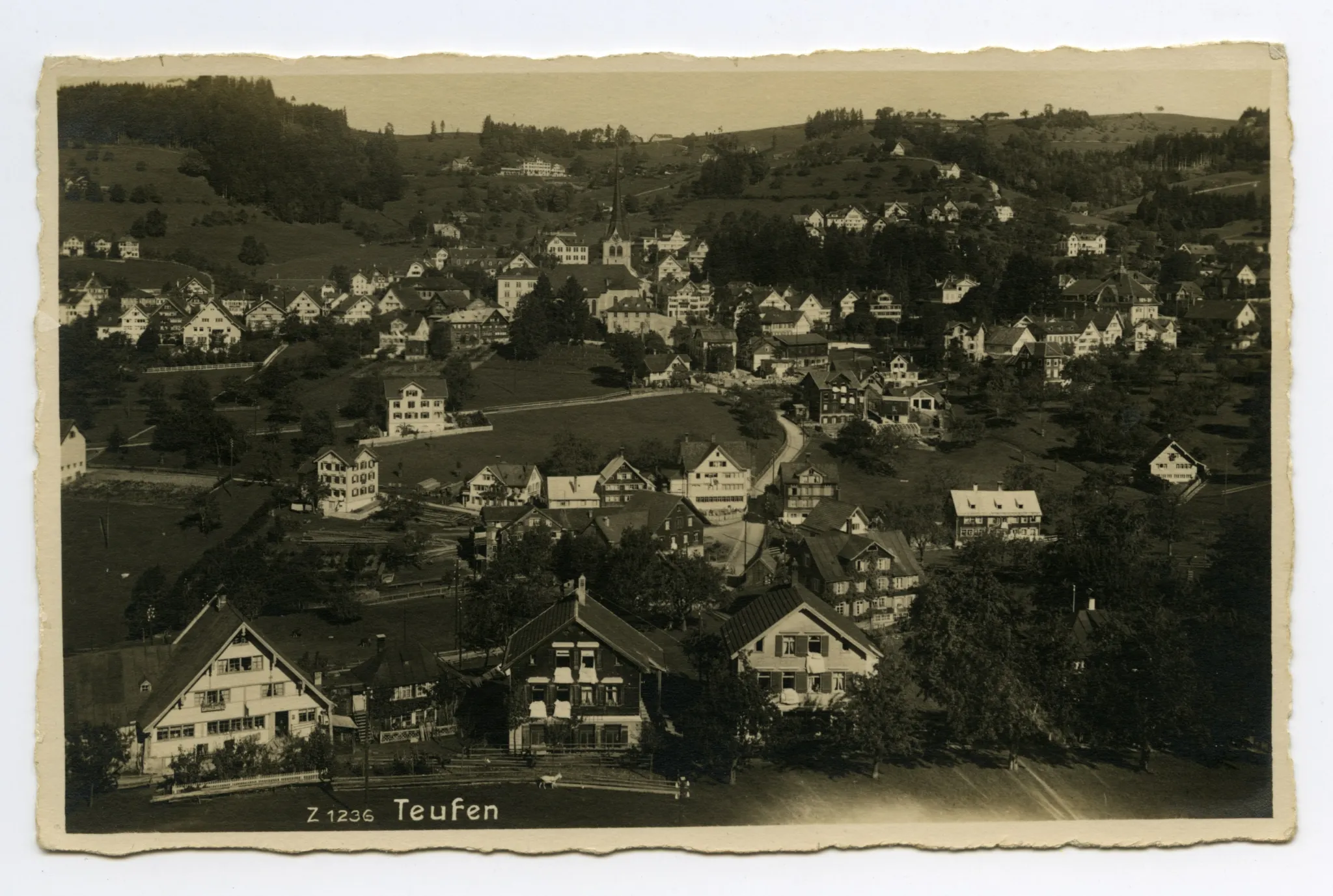 im Vordergrund Schönenbüel, mit Bächli, Bahnhof und Krankenhaus, Blick zu Bad Sonder und Schäflisegg (vgl. Hc.15-25)